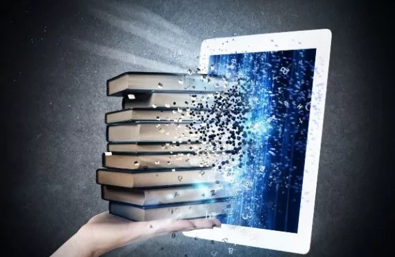 Image de livres passant dans un écran numérique